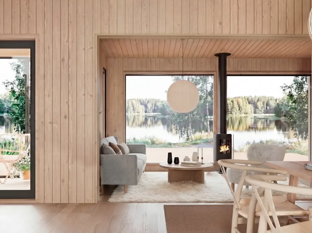 Mökin olohuone, josta avautuu näkymä järrvelle